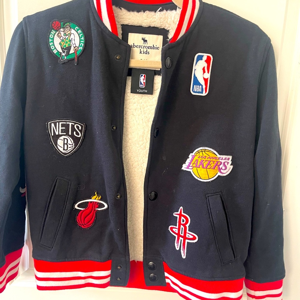 Abercrombie sports patch jacket: kids unisex: Fleece layer on the inside.